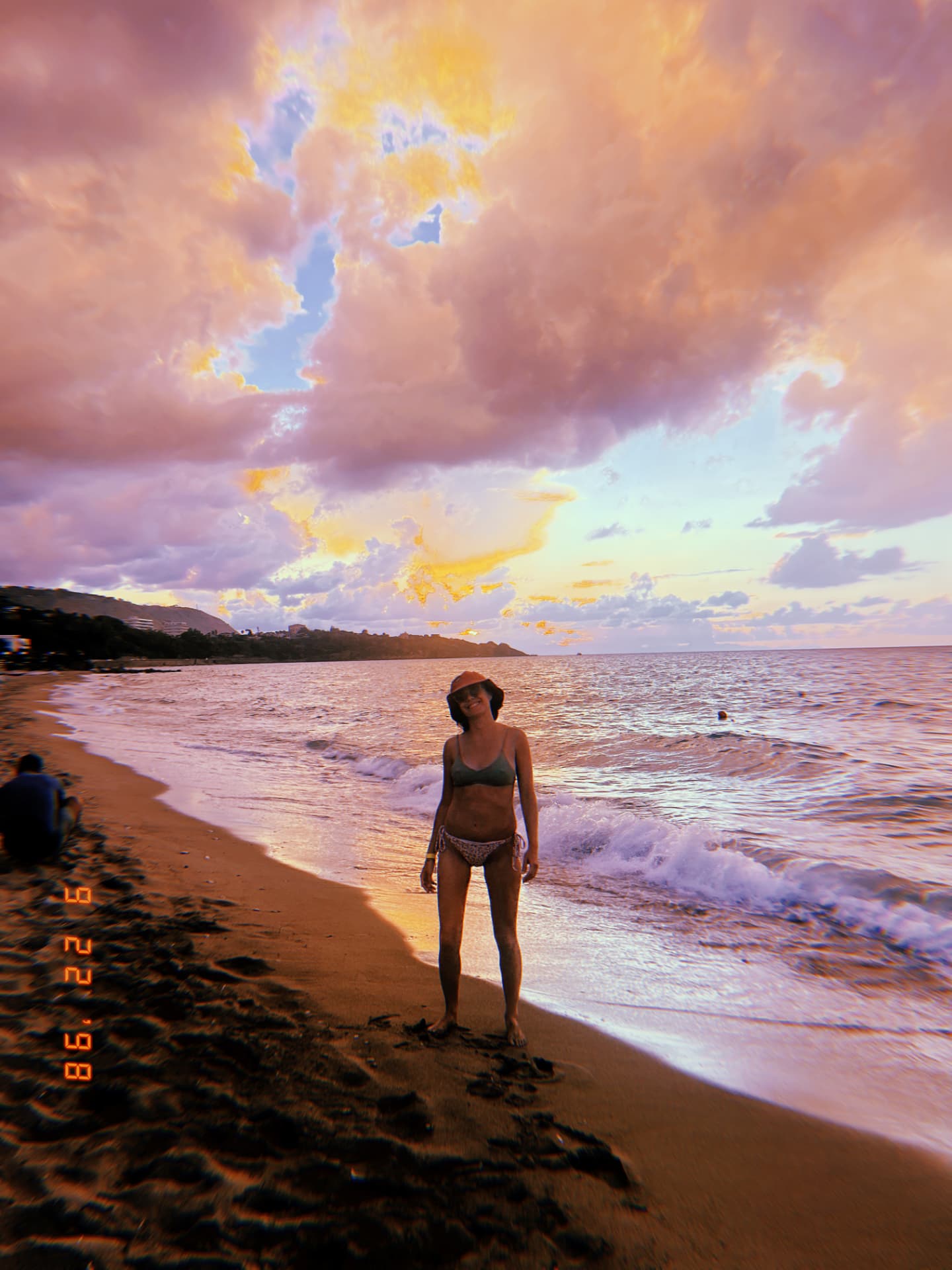 Lisa at the shoreline at sunset